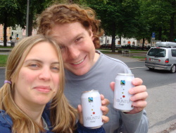 Tom and Chloe drinking Ubuntu Cola in Stockholm